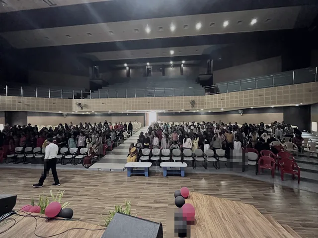An auditorium seen from the stage during a session